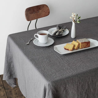 Minimalist table setting with white ceramic tableware.