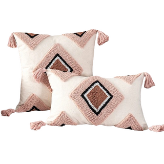 Tufted cotton cushion covers with pastel diamond motif and hand-tied tassels - perfect for kid's nursery or playroom.