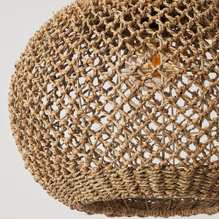 Handwoven seagrass pendant light with an open, rounded bell shape, showcasing natural texture and woven detailing. Perfect for hallways, bedrooms, dining and living rooms.