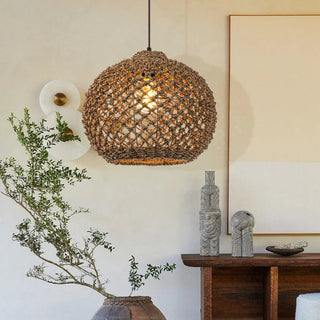 Handwoven seagrass pendant light with rounded dome shape - perfect for wabi sabi, contemporary, minimalist decor.
