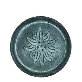 Round embossed galvanized iron tray, a stylish metal serving plate perfect for kitchen tableware. This durable serving plate features intricate embossing, adding a touch of elegance to your dining experience. Ideal for both practical use and natural home décor, it enhances your table setting with rustic charm and versatility.
