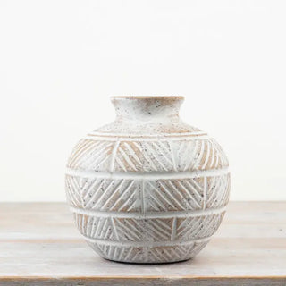 Textured white ceramic vase with organic handcrafted appearance
