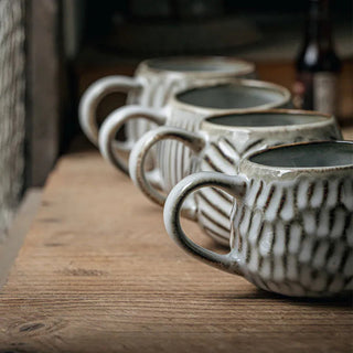 Handmade ceramic cups with textured finish and soft grey glaze. Perfect for coffee, tea, snacks or soup.