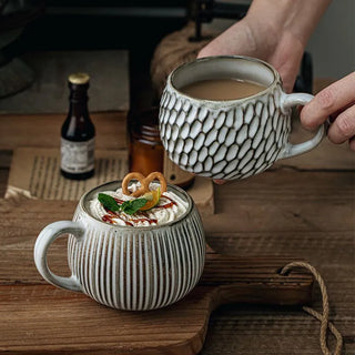 Handmade ceramic cups with textured finish and soft grey glaze. Perfect for coffee, tea, snacks or soup.