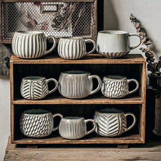 Handmade ceramic cups with textured finish and soft grey glaze. Perfect for coffee, tea, snacks or soup.