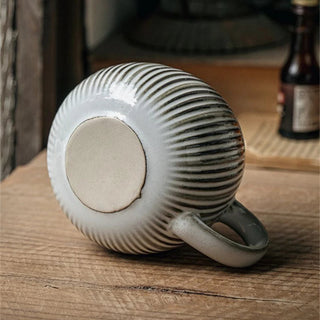 Handmade ceramic cups with textured finish and soft grey glaze. Perfect for coffee, tea, snacks or soup.