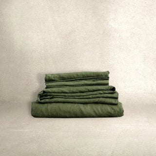 Forest green linen sheets with matching pillowcases