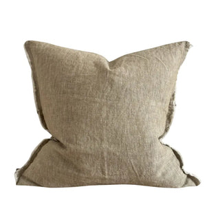 Olive linen cushion with frayed edges and soft textured finish.