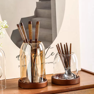 Modern glass cutlery organiser with wood base.