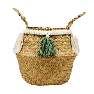 Handwoven natural seagrass storage basket with handles, perfect as a stylish hanging basket, pot planter, or decorative storage solution. This eco-friendly basket, adorned with charming tasselled fringe, adds a natural boho touch while keeping your space organized. Shop handcrafted storage baskets at our natural homeware store.