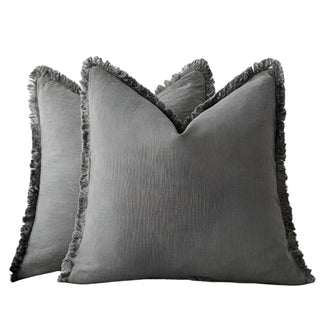 Grey fringed cotton cushion covers, made from 100% natural cotton with soft ruffled edges. Perfect for minimalist, boho-inspired living space.