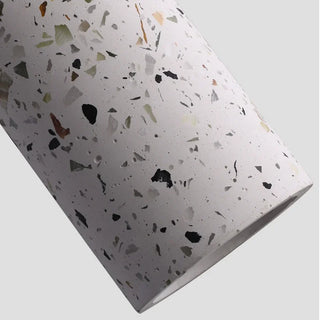 Terrazzo-style patterned concrete light for minimalist and nordic interiors.