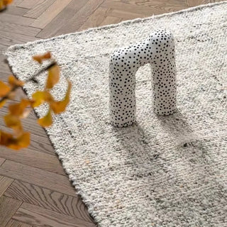 Grey Nordic handmade wool and jute rug with a natural, heathered texture in neutral tones—ideal for minimalist and earthy home décor.