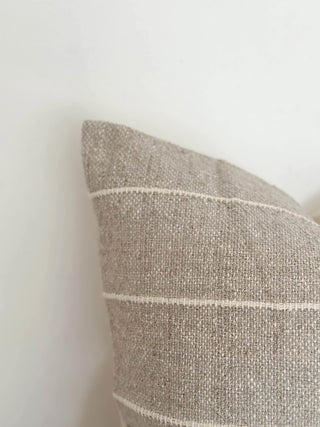 Minimal striped cushion for modern and natural interiors.