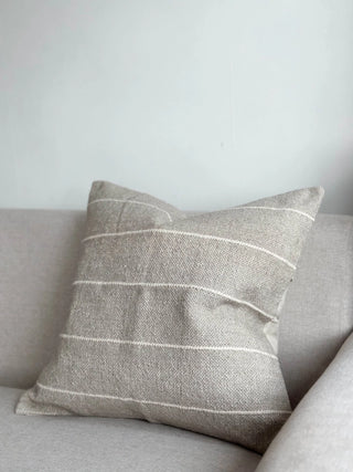 Textured cotton cushion cover for sofa or bed layering.
