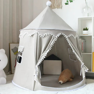 Light grey children’s play tent styled with cushions for reading nook.