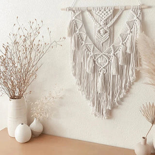 Handmade macrame wall hanging – a beautifully crafted natural home decor piece. Featuring intricate knot patterns and tassel details, this boho-inspired wall art adds texture and warmth to any space. Perfect for modern, rustic, or Scandinavian interiors. Ideal for living rooms, bedrooms, or entryways. 