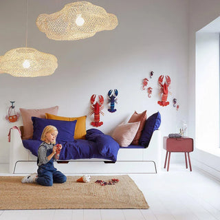 Natural jute floor rug styled in minimalist kids' room Arkaim Home