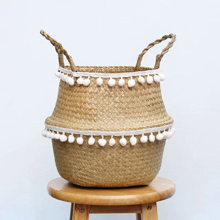 Handwoven seagrass basket with white cotton pom pom trim, Arkaim Home