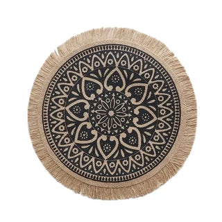Set of four hessian boho placemats featuring a natural fibre weave and mandala design, perfect for rustic or coastal table settings.