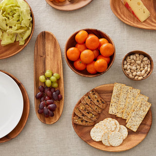 Organic wooden plates in warm brown tones for serving fruits, crackers, and cheese, Arkaim Home