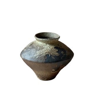 Kai rustic pottery vase with textured earthy glaze.