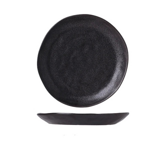 Black porcelain plate with a stoneware-style matte texture, minimal design, and artisanal finish, ideal for serving a variety of main dishes.