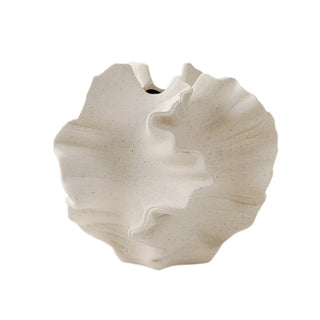 The Pontus Ceramic Vase, a decorative vase inspired by marine life, featuring an organic, coral-like shape with intricate textures and a matte off-white finish. This sculptural piece captures the fluidity of ocean waves, making it a perfect accent for coastal, Japandi, and minimalist interiors. Ideal as a standalone art piece or for dried floral arrangements.
