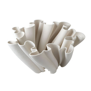 A sculptural, white decorative centerpiece bowl with an intricate, undulating design. The bowl's structure features twisted, fluted elements that create a dynamic, flowing appearance. The design is modern and minimalist, adding an artistic touch to home décor.