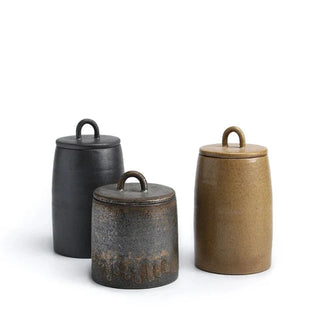 Set of three handcrafted Japanese stoneware storage jars with lids, featuring earthy tones and a rustic finish. Perfect for kitchen organization, these ceramic canisters provide airtight storage for tea, coffee, spices, or pantry essentials. A stylish and functional addition to natural homeware and minimalist décor.