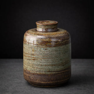 Minimalist ceramic storage jar for tea, coffee, sugar and dry foods.