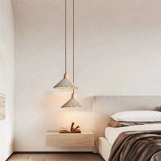 Modern cement pendant lights with wood detail and organic texture