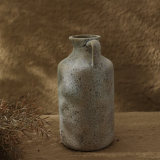 Tami decorative earthy ceramic vase with jug shape and handle – a natural contemporary home décor accessory inspired by Wabi-Sabi aesthetics. Perfect for rustic, natural and minimalist interiors.