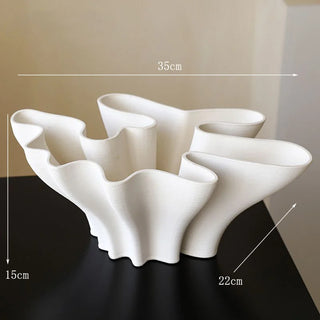 White wave textured ceramic vase with layered design.