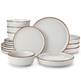 Modern stoneware dinnerware set featuring a rustic design with a speckled grey finish and a warm brown trim.