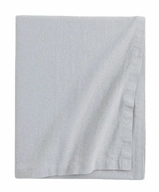 Light grey cotton tablecloth with soft texture and elegant drape, styled for a modern, minimalist dining setting.