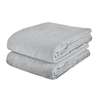 Light grey pure linen flat sheet and 2 pillowcases set. Available in a range of neutral colours and sizes from Arkaim Home. Natural linen is breathable, textured, and perfect for relaxed year-round comfort. Great for modern, Boho, Scandi, wabi-sabi bedroom interiors.