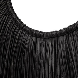 Handcrafted black seagrass wall hanging made by Indonesian artisans.