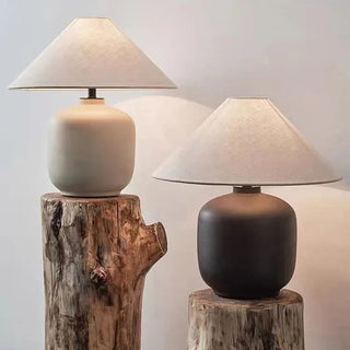 Modern ceramic table lamps with linen lamp shades for minimalist, contemporary interiors.