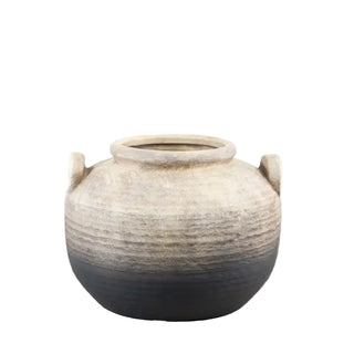 A round ceramic vase with a dark charcoal-black gradient at the bottom and two small loop handles on the sides.