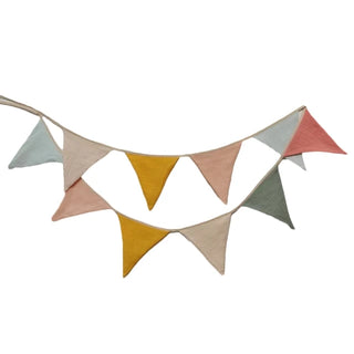 Cotton flag bunting banner in warm pastel colours for child’s nursery or playroom.