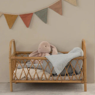 Cotton flag bunting banner in warm pastel colours for child’s nursery or playroom.