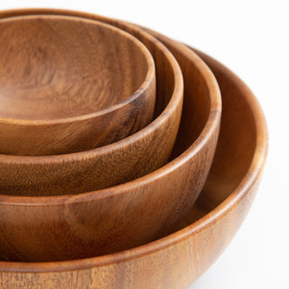 Nesting wooden bowls in warm natural tones, Arkaim Home