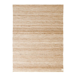Anvi handmade wool and linen rug in natural earthy tones, featuring a textured, hand-loomed weave—ideal for Scandi, minimalist, or modern interiors.