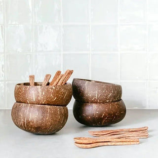 Handmade coconut shell bowls with wooden spoons