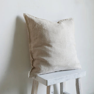 Plain linen cushion for beds, sofas and chairs.