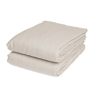 Natural pure linen flat sheet and two standard pillowcases set. Available in a range of neutral colours and sizes from Arkaim Home. Natural linen is breathable, textured, and perfect for relaxed year-round comfort. Great for modern, Boho, Scandi, wabi-sabi bedroom interiors.