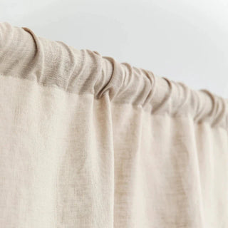Beige linen rod pocket curtain panel — natural linen window curtain with soft drape and textured finish.