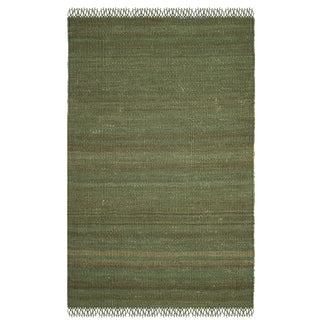 Handmade reversible jute rug in a trendy olive green color, crafted from all-natural fibers with a soft texture and durable woven design. Perfect for boho, modern, and Scandinavian-inspired homes.