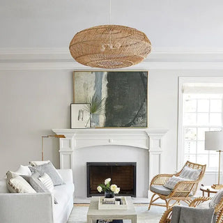 Handwoven natural rattan oval pendant light, ideal for Boho, coastal, or Scandinavian interior lighting.
